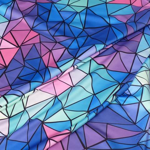 Pružný úplet s geometrickým vzorem originální modrá fialová růžová výrazná geometrie plavkovina barevná látka pružná látka 