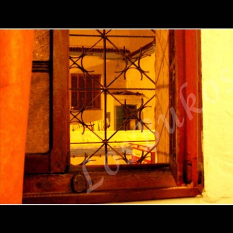 Skrz mříže prádlo dům město zeď afrika okno maroko ulice mříže pavlač výhled 