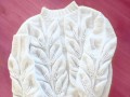Pletený svetr s listy na praní