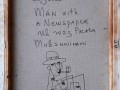 Muž s novinami