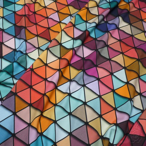 Barevná látka s geometrickým vzorem geometrický geometrický vzor barevná látka vzorovaná látka látka na tričko 